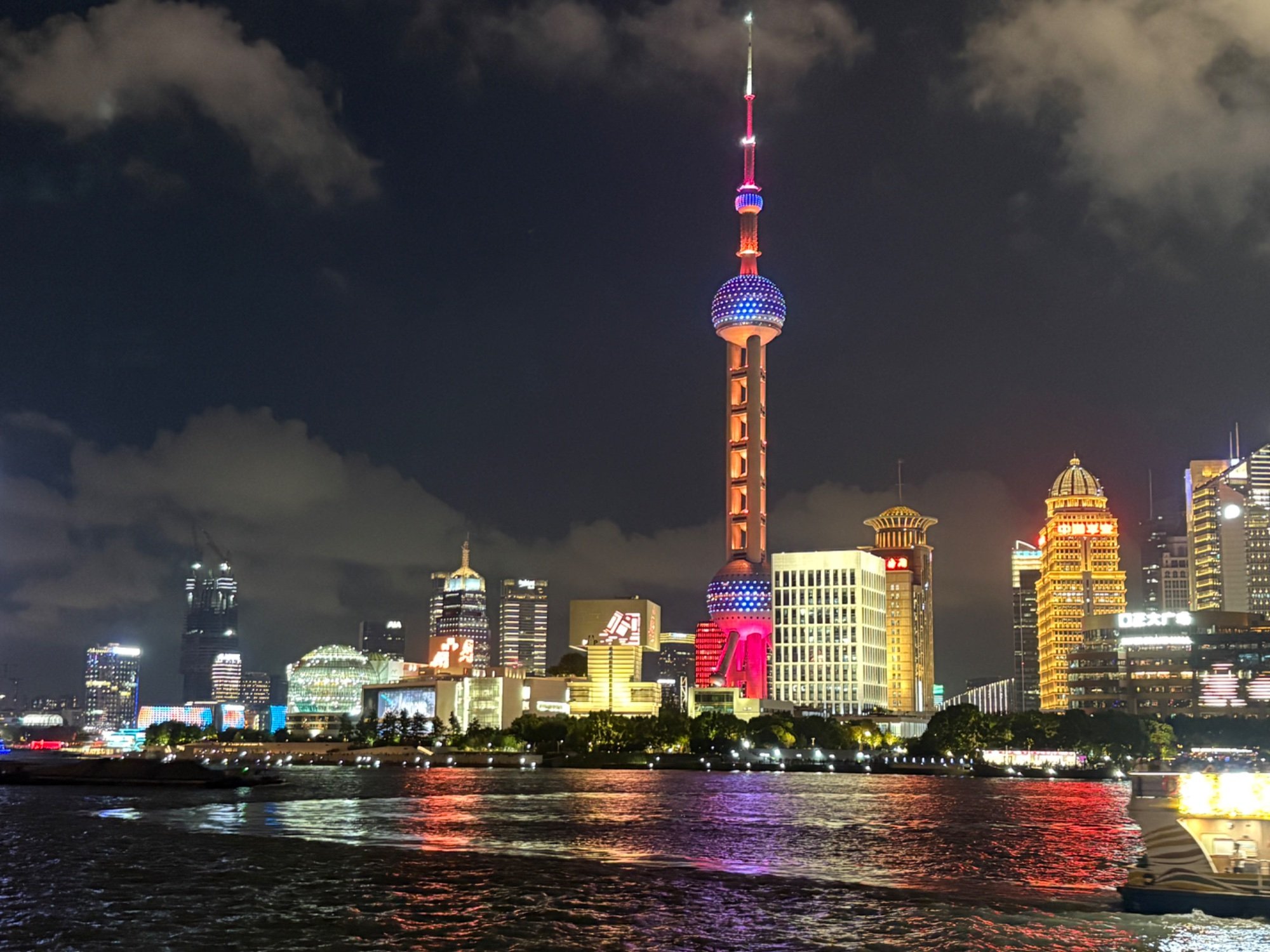 The Pudong skyline at night in Shanghai, seen across the Huangpu river